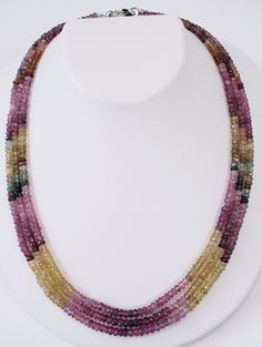 Tourmalines are given a center stage to turn on their full-color show. From dark greens to yellows and pinks, tourmaline has it all. The 3 strands multicolor necklace is eager to transmit to you this gemstones' qualities: tourmaline attracts inspiration, compassion, tolerance, and prosperity. *Natural Multi Tourmaline Rondelle Faceted Beads, *Stones: Watermelon Tourmaline *Clasp: Surgical steel *End to end Length: 18 Inches *Bead Size: 3.5-3.8 mm approx. *Carat wt.: 204.58Ct FREE Shipping and Gi Multicolor Tourmaline Multi-stone Necklace, Multicolor Multi-stone Tourmaline Necklaces, Multicolor Multi-stone Tourmaline Necklace, Handmade Multicolor Tourmaline Necklaces, Multicolor Tourmaline Faceted Beads Necklace, Multicolor Tourmaline Gemstone Beads Necklaces, Multicolor Tourmaline Gemstones In Round Shape, Multicolor Tourmaline Beaded Necklace With Faceted Beads, Multicolor Faceted Tourmaline Necklaces