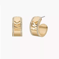 These Earrings Are A Perfect Blend Of An Understated Yet Dramatic Statement. This Makes Them Perfect For Both Casual And Formal Occasions. Whether You Wear Them With Your Little Black Dress Or A Pair Of Jeans, These Earrings Never Fail To Add A Touch Of Sophistication, Elegance, And Glamour To Your Look. Details: Closure: Post Primary Color: Gold Material: Brass Measurements: Approx. Hoop Diameter: 15mm, Width: 9mm Brass Hoop Earrings, Michael Kors Fashion, Michael Kors Jewelry, Brass Hoops, Gold Fashion, Gold Material, Primary Color, Primary Colors, Gold Tones