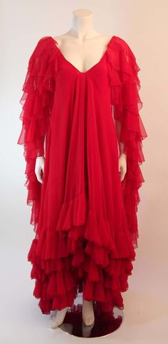 For Sale on 1stDibs - This is the Personal Property of Magda Gabor, sister of Zsa Zsa and Ava Gabor. It is a fantastic iconic design by Ruben Panis. This wonderful gown is made Red Georgette Evening Gown, Ava Gabor, Magda Gabor, Gabor Sisters, Zsa Zsa, Ruffle Gown, Red Chiffon, Iconic Design, Chiffon Ruffle