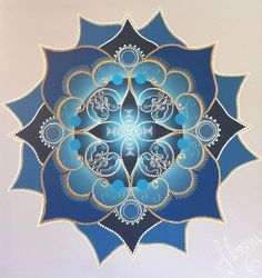 a blue and gold circular design on a white wall