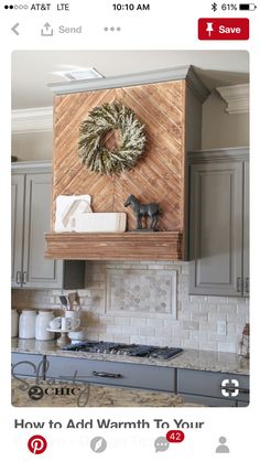 the kitchen is decorated for christmas with wreaths and other decorations on the wall above the stove