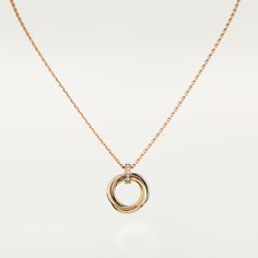 Cartier - Trinity necklace - Necklace Woman Gold/White gold/Pink gold - Trinity necklace, 18K white gold (750/1000), 18K rose gold (750/1000), 18K yellow gold (750/1000), set with 5 brilliant-cut diamonds totaling 0.06 carats, 18K rose gold (750/1000) chain. Width: 1.8 mm. Inner diameter: 13.4 mm (for size 17). Trinity Necklace, Necklace Woman, Trinity Ring, Rose Gold Chain, Party Style, Sparkle Diamonds, Pendant Set, Party Fashion, Brilliant Cut Diamond