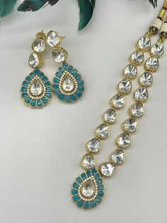 We bring beautiful Jewelry sure to elevate any look! Kindly pay attention to all photos and video and ask questions about the item prior to ordering. Dual-tone Kundan Bridal Necklace For Celebration, Bollywood Style Kundan Bridal Necklace In Dual-tone, Bollywood Style Dual-tone Kundan Necklace For Wedding, Bollywood Style Dual-tone Kundan Bridal Necklace, Dual-tone Temple Jewelry Sets For Wedding, Temple Jewelry Sets In Dual-tone For Weddings, Dual-tone Jewelry Sets For Wedding, Traditional Dual-tone Wedding Jewelry Sets, Dual-tone Chandbali Jewelry Sets For Weddings