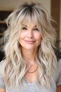 34 Long Shag Hairstyles That Embrace Boho Beauty - The Hairstyle Edit Long Shag Haircut With Face Framing, Hairstyles With Bangs Blonde, Long Shag Haircut Fine Hair Round Faces, In Style Hair 2024, Choppy Long Hair With Bangs, Long Hair Shaggy Bangs, Very Layered Long Hair With Bangs, Layered Platinum Blonde Hair, Gray Long Hair Older Women