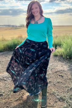 Ride into style with our God's Country Maxi Skirt! This black maxi skirt features a playful print of cowboys and windmills, perfect for channeling your inner country chic. Add a touch of whimsy to your wardrobe with this must-have piece. Circle skirt 96% Polyester/4% Spandex This skirt has an elastic, VERY STRETCHY waistband, no zippers and a slip underneath. Hand wash cold. Lay flat to dry. THIS IS A LONG SKIRT-NOTE MEASUREMENTS SIZE OUTSEAM WAIST S/M 39.5" 12.5" L/XL 40" 14.5" 2X/3X 40" 16.5" Black Maxi Skirt, Black Maxi, Country Chic, Circle Skirt, Long Skirt, Lay Flat, Maxi Skirt, Hand Wash, Spandex