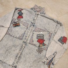 Selling Vintage 90s Vtg Get Used By Elie Womens M Medium Distressed Patchwork Patches Denim Button Shirt Light Jacket. Missing Four Buttons (See Photos) (Both Cuffs And 2 In The Front). Also Has What Appears To Be A Rip In The Sleeve (I Don't Think It's Supposed To Be Like That But It Can Be Kind Of Hard To Tell) (See Photos). Comes As Is As Shown. You Can See The Condition From The Photos. You Can Get Further Information From Looking At What Is Shown In The Photos. Pricing Low To Sell Fast. I Offer Combined Shipping On Multiple Purchases. All Purchases Should Arrive Within 2 To 9 Days. International Buyers Should Expect Longer Shipping Time. If There Are Any Issues Please Do The Right Thing Vintage Stonewashed Tops For Fall, Vintage Denim Blue Tops For Streetwear, Vintage Blue Reworked Denim Jacket, Casual Long Sleeve Reworked Denim Jacket, Vintage Reworked Denim Jacket, Vintage Reworked Denim Jacket With Long Sleeves, Vintage Long Sleeve Reworked Denim Jacket, Vintage Reworked Long Sleeve Denim Jacket, Denim Shirt Jacket