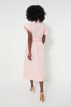 Elegant in its simplicity, the structured and ultra-ladylike Pink Salt Chloe Dress is done in a textured cotton-blend fabric that is sure to turn heads for its design details. The moire pattern throughout and trapunto stitching on the sleeves, placket, and hemline complete this midi moment, making it feel extra special with minimal effort. Pair with heels or flats, sunnies or statement earrings, for day or night, and rest assured that you look fabulous! Spread collar Short wing sleeves Button fr Chic Structured Dresses For Spring, Modern Fitted Cotton Dresses, Spring Structured Dresses, Chic Structured Midi Dress For Spring, Structured Short Sleeve Spring Dress, Structured Short Sleeve Dress For Spring, Feminine Cotton Midi Dress For Daywear, Chic Structured Spring Dresses, Structured Midi Dress For Office In Spring