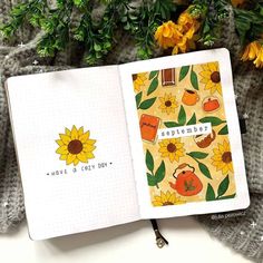 an open notebook with sunflowers on it