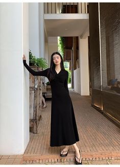 5ft 4''(166cm) tall, 95 lbs(43kg) weight and wearing a size S164cm/49kg wearing a size S - BLACK- Knitted- Pullover- V-neck- Long dress style Black Full-length Winter Dress, Black Full Length Winter Dress, Black Full Length Dress For Winter, Long Dress Style, Black Knit, Knitted Pullover, Long Dress, V Neck, Knitting