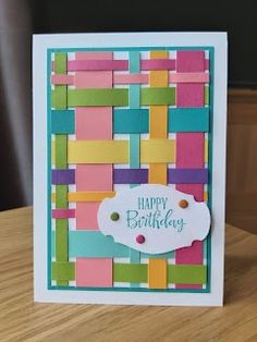 a colorful birthday card with a tag on it