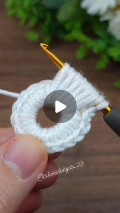 the video shows how to crochet an object