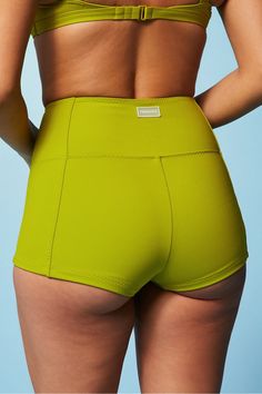 High-Waisted Swim Short Fabletics green female Activewear >> Womens >> Swim >> Bottoms regular Swim 4-Way Stretch Green Trendy Stretch Activewear, Fitted Green Athleisure Bottoms, Trendy Green Stretch Activewear, Green Elastane Workout Bottoms, Summer High Waist Activewear With Contoured Waistband, Sporty High Waist Swimwear For Spring, Sporty High Waist Spring Swimwear, Summer Workout Bottoms With Contoured Waistband, Fitted Green Workout Bottoms