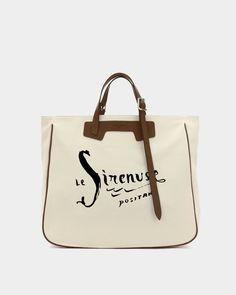 Designed by Andrea Ferolla of Chez Dede for Le Sirenuse, this tote-bag is entirely and carefully Made in Italy with genuine Italian vegetable tanned calf leather and 100% natural silk-screened fabric. Bag size 44 x 40 x 14 cm - 17 x 16 x 6 inches Adjustable handle length 35 to 65 cm - 14 to 26 inches 100% cotton italian fabric 100% cotton lining Interior pocket Smartphone pocket Leather strap keychain Silk screen printing with traditional technique Cotton dust-bag with printed logoMade in Italy Silk Tote Bag, Le Sirenuse, Strap Keychain, Foldable Bag, St Regis, Coach Horse And Carriage Tote, Natural Silk, Silk Screen Printing, Italian Fabric