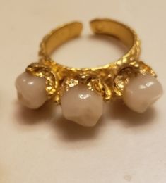 Trio tooth ring on gold coated brass bands.  Adjustable  (comfortable up to size 8.5 ish; message to customize larger sizes! ) Engament Rings, Tooth Ring, Teeth Jewelry, July Baby, Brass Band, San Antonio Tx, Flower Ring, Rings Statement, Gold Leaf