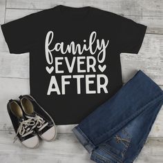 "Kids Family T Shirt Family Ever After Adoption Tee Mom Shirts Parents Matching Shirts Let everyone know you're great ending is family ever after in this adorable pro adoption shirt. This is a great tee for Dads, Moms, Kids, Babies, Aunts and so much more. Show off how proud you are of your family in this family ever after tee. Soft, ring spun cotton t-shirt. Machine wash and dry. Features a tear away tag for comfort and includes a drawstring cotton gift bag. Direct to garment printed using the Family Matching Short Sleeve Tops For Family Events, Casual Cotton T-shirt For Family Events, Funny Family Shirt With Letter Print, Cute Letter Print Tops For Family Events, Casual T-shirt For Mother's Day Family Gatherings, Funny Letter Print T-shirt For Family Events, Funny T-shirt With Letter Print For Family Events, Mother's Day Cotton T-shirt For Family Events, Family Matching Tops With Letter Print For Gatherings