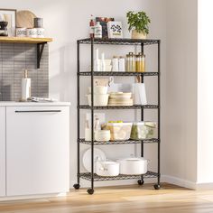 a kitchen shelving unit with lots of items on the shelves in front of it