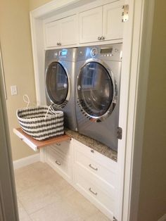 an image of a washer and dryer in a laundry room