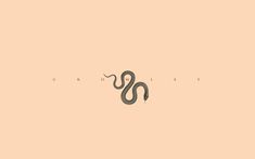 an image of a snake that is in the middle of it's logo design