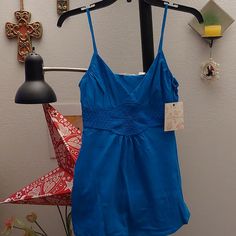 Beautiful Teal Blue Spaghetti Strap Top With Crochet Detail And Flowy Bottom. Brand New Never Worn Blue Camisole For Beach Summer, Blue Camisole For Beach And Summer, Blue Camisole For Beach In Summer, Blue Cotton Camisole For The Beach, Blue Summer Camisole For The Beach, Blue Camisole Tank Top For Vacation, Blue Camisole For Spring Vacation, Blue Camisole For Vacation, Blue Summer Style Camisole For Spring