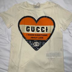 Gucci Kids Tshirt Size 8 New With Tags - Never Used 100% Authentic Will Ship Within 24 Hrs Serious Offers Only ~ Gucci Cotton Tops With Logo Print, Trendy Gucci Crew Neck T-shirt, Gucci Cotton T-shirt With Logo Print, Gucci Graphic Print T-shirt For Streetwear, Gucci Cotton Top For Streetwear, Gucci Cotton Tops With Letter Print, Trendy Gucci Tops For Streetwear, Gucci Letter Print T-shirt For Streetwear, Gucci Cotton Graphic Tee