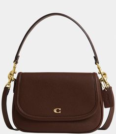 From COACH&#x2C; the Legacy Small Pebbled Leather Shoulder Bag features: Featuring a COACH logo flap&#x2C; this Legacy shoulder bag sits just beneath the underarm with the shorter strap or it can be worn as a crossbody. Small sized bag; 10"W x 7-.25"H x 2-.75"D (width is measured across the bottom of handbag); 1.32 lbs. approx. weightApprox. 7-.5" L removable short strap; 21-.5" L r Small Brown Shoulder Bag, Purse Capsule Wardrobe, Classic Coach Bags, Coach Small Purse, Brown Coach Shoulder Bag, Everyday Designer Handbags, Date Night Purse, Coach Legacy Bag, Small Coach Purse