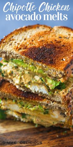 a grilled chicken avocado melts sandwich on a cutting board