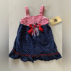 Good Lad Fourth Of July Girls Toddler 2t Dress Red White Blue Dress New Playful Red Cotton Sundress, Red Cotton Dress For Play, Cute Navy Sleeveless Dress, Red Cotton Casual Dress, Cute Sleeveless Navy Dress, Navy Cotton Playtime Dress, Navy Cotton Dress For Playtime, Red Cotton Sundress With Ruffles, Red Cotton Lined Sundress