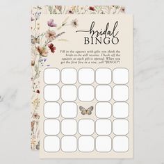 the bridal bingo game is shown with flowers and butterflies on it's side