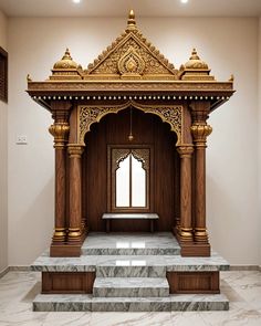 an ornate wooden structure with steps leading up to the door and windows in the background