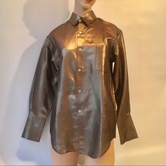 Rare Comme Des Garcons Oversized Gold Shirt. Polytech Fabric. Bust 40” Waist 40” Shoulder Seam To Shoulder Seam 17.5” Length Center Front 28” Excellent Condition! Long Sleeve Sheen Blouse For Work, Metallic Button-up Blouse For Fall, Long Sleeve Sheen Tops For Work, Designer Gold Blouse For Workwear, Fall Workwear Blouse With Sheen, Spring Sheen Tops For Workwear, Designer Gold Tops For Workwear, Designer Gold Tops For Work, Metallic Long Sleeve Tops For Work