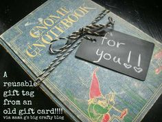 an old book with a tag on it that says, for you i reusable gift tags from an old gift card