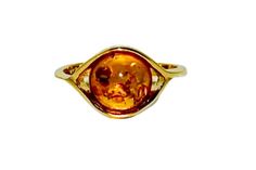 Very feminine ring handcrafted with sterling silver covered 14ct. gold and natural Baltic amber.Amazing cognac amber stone fitted in simple gold setting.This lovely jewellery suitable for everyday and evening wear.Amber stone created by nature over 25 millions years ego, amber attracts good luck, balances emotions, dissolves negative energy. Care Instructions: To maintain your jewellery, wipe gently with a cotton cloth that is soft and clean. Do not soak in water. Avoid contact with soaps, deter Gold Amber Ring, Amber Ring Gold, Amber Engagement Ring, Stone Ring Design, Amber Fossils, Golden Ring, Amber Ring, Natural Amber, Crystal Healing Stones