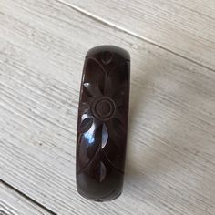 "Lovely old bakelite (tested) bangle bracelet in rich chocolate brown. Approx. 7/8\" wide with a carved floral design. 2.5\" opening. Good vintage condition with light wear. See more bakelite here: http://www.etsy.com/shop/veraviola/search?search_query=bakelite&search_type=user_shop_ttt_id_5813259&shopname=veraviola Please visit my shop for more vintage finds! http://www.veraviola.etsy.com" Carved Brown Bangle Jewelry, Vintage Bronze Ceremonial Bangle, Ceremonial Vintage Bronze Bangle, Vintage Carved Brown Bracelets, Vintage Brown Flower-shaped Jewelry, Bakelite Bracelets, 14k Gold Wedding Band, Layered Rings, Brown Flowers