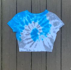 Tie-dye cropped tee shirt  Ocean blue and grey  Ladies size Medium  Chest: 15.5 inches across  Length: 16 inches shoulder to hem Y2k Tie Dye, Spring Tie Dye Short Sleeve Crop Top, Cheap Tie-dye Crop Top For Summer, Tie Dye Cropped Top, Casual Tie-dye Short Sleeve Crop Top, Spring Tie-dye Short Sleeve Crop Top, Blue Tie Dye Shirt, Cropped Tee Shirt, Tie Dye Crop Top