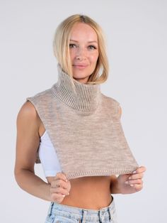 "Turtleneck Dickie, Knit Wool Dickie, Dickie Collar, Turtleneck Scarf, Mohair Wool Scarf, Knitted Neck Warmer Women, Knit Neck Accessories, Beige An original and practical knit dickie that covers the neck and chest area in the cold season. The model is made of soft, pleasant-to-the-body wool blend yarn. The neck is decorated with a double stand-up collar, which reliably retains heat. The turtleneck dickie is easy to put on and is a great alternative to scarves. One size fits all Care instructions: - hand wash and spin - Ironing at a minimum temperature - do not use bleach - horizontal drying on a flat Wide 40 cm=15,7\" Height 31cm = 12,2\"" Snug Fit Knitted Tops, Snug Knitted Top, Knitted Stretch Sweater Vest For Winter, Stretch Knitted Sweater Vest For Winter, Winter Stretch Knitted Sweater Vest, Winter Chunky Knit Top One Size, Chunky Knit Winter Top, Cozy Snug Knitted Tops, Beige Hand Knitted Tops