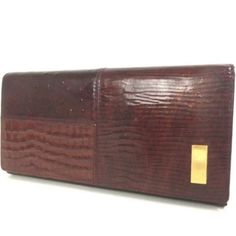 Category Purse Clutch Wallet Brand Givenchy Size W19cm X H9.8cm X D2.4cm W7.5' X H3.9' X D0.9' Color Bordeaux Burgundy Gold Material Leather Spec Bill Compartmentx1,Coin Pocketx1,Card Slotx12,Inside Pocket X3 This Wallet / Clutch Does Have Very Minimal Signs Of Wear. All Wear Is Shown In The Images. Elegant Textured Leather Rectangular Wallet, Elegant Textured Leather Wallet, Brown Textured Leather Clutch For Formal Occasions, Formal Brown Textured Leather Clutch, Rectangular Leather Evening Wallets, Brown Bifold Clutch For Evening, Luxury Brown Textured Leather Clutch, Elegant Brown Textured Leather Wallet, Designer Textured Leather Rectangular Clutch