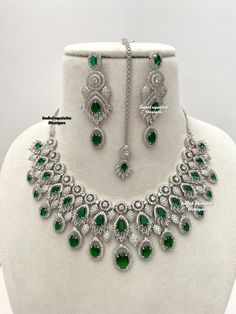 American Diamond Necklace Set/CZ Necklace/ Reception Jewelry/Statement Necklace Set/silver green     All items are shipped from Brampton, Ontario, Canada. If you need your item by a certain day, please reach out to us for express delivery option before placing the order so that we can update the shipping for you. Standard shipping/delivery timeline Below are the delivery timeline estimates once the order is shipped. ---> USA delivery timeline * 3-6 business days to major urban centers in USA. It Green Crystal Jewelry Sets With Sparkling Stones, Dazzling Green Emerald Necklace, Green Sparkling Stones Jewelry Sets For Wedding, Dazzling Green Diamond Necklaces, Dazzling Green Diamond Necklace, Dazzling Green Emerald Necklace For Anniversary, Formal Green Cubic Zirconia Necklaces, Formal Green Cubic Zirconia Necklace, Green Sparkling Stones Jewelry For Anniversary