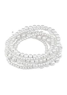 Seven rows of silver beads and pearls make up this stunning stretch bracelet from Napier. | Napier 7 Row Bead Stretch Bracelet, Silver High Fashion Earrings, Christmas List Ideas, Stretchy Bracelets, American Woman, Silver Bead, Classic Jewelry, Modern Women, Beaded Stretch Bracelet, Bracelet Silver