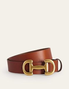 Adorned with gold-tone snaffle hardware, the Iris leather belt is an easy way to finish off all those outfits that just need ‘a little something’. Unique Belts, Iconic Accessories, Wardrobe Overhaul, Womens Belts, Tan Women, Tan Belt, Women Belt, Black Iris, Tan Woman