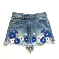 Sjyp Cut Off Denim Shorts Womens Small Blue White High Rise Embroidered Flowers Women's Cut Off Embroidered Floral High Rise Shorts Sjyp Steve J & Yonip Size: Small Inseam - 1" Rise - 12" Waist Laying Flat - 13.5" Flat Front Blue Zipper With Button Closure Belt Loops Embroidered Floral Detail Cotton Construction Denim Fringe / Raw Hem High Rise Timeless & Versatile Women's Sjyp Floral Embroidered Shorts In A Size Small. High Rise Waist With Floral Detail That Make These A Standout To Any Closet. Mint Condition - Worn Once. Originally $348. Fast Same Day Ship! Cd Denim Fringe, Embroidered Denim Shorts, Shorts Womens, Embroidered Shorts, Embroidered Denim, Denim Shorts Women, High Rise Shorts, Embroidered Flowers, Cut Off