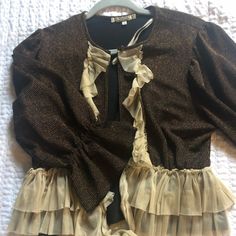 So Pretty And Unique. Flowy Cardigan , Ties At Bottom. I Brown Bohemian Open Front Cardigan, Brown Long Bohemian Cardigan, Pretty Sleeves, Flowy Cardigan, Flowy Cardigans, Flowy V-neck Bohemian Cardigan, Vintage Brown V-neck Cardigan, Black Bohemian V-neck Cardigan, So Pretty