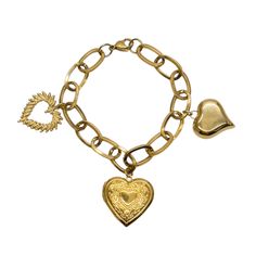 Meet your favorite charm bracelet, Lola! Handcrafted from water and tarnish resistant stainless steel elements, this gorgeous piece is 8” in length, and will clasp shorter as desired. It features three different heart charms, all varying in size and design to create an unforgettable charm piece you will treasure for years to come. Lola has a gorgeous, upscale vintage vibe to its design. Be the "it" girl with this piece, and you will always be asked, "Where did you get that bracelet?!" --8" Lengt Stainless Steel Heart Charm Jewelry, Metal Heart Charm Dangle Jewelry, Metal Dangle Jewelry With Heart Charm, Nickel-free Double Heart Stainless Steel Jewelry, Adjustable Charm Bracelet With Heart Pendant, Adjustable Heart Charm Bracelet With Heart Pendant, Adjustable Metal Charm Bracelet With Heart Charm, Adjustable Heart Charm Bracelet, Personalized Heart-shaped Metal Chain Bracelet