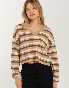 Brixton Ivy V-Neck Sweater. Rib Knit Construction. Allover Stripe Print. V-Neckline. Long Sleeves. Relaxed Fit. 100% Acrylic. Machine Wash. Imported. Model Is Wearing A Size Small. Model Measurements:height: 5'8" Bust: 32"waist: 25"hips: 34" Striped V-neck Top For Fall, Casual Brown V-neck Sweater For Spring, Striped V-neck Knit Top For Spring, Striped V-neck Sweater For Fall, Fall Striped V-neck Top, Fall Textured Knit Long Sleeve V-neck Sweater, Fall Cropped V-neck Sweater With Textured Knit, Trendy Ribbed Stretch V-neck Sweater, Casual Brown V-neck Knit Top