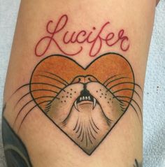 a close up of a person's leg with a tattoo on it that says suffier