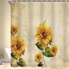 a shower curtain with sunflowers painted on it