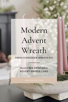 three pink candles sitting on top of a table with the words modern advent wreath over it