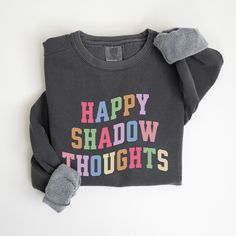 Happy Shadow Thoughts KOTLC Sweatshirt, Keeper of the Lost Cities Sweatshirt, Shannon Messenger, Lost Cities Keeper Shirt, Kotlc Shirt Gift High-quality, stylish pieces and comfortable t-shirts and sweatshirts! Our collection is crafted from premium materials, ensuring a perfect blend of quality and comfort. For our sweatshirts, we use a mix of cotton and polyester, while our t-shirts are available in 100% cotton or a luxurious blend of ringspun cotton and polyester. Important Note: Please refer Kotlc Merchandise, Multicolor Letter Print Sweatshirt Relaxed Fit, Multicolor Letter Print Relaxed Fit Sweatshirt, Kotlc Clothes, Kotlc Merch, Shadow Thoughts, Shannon Messenger, Keeper Of The Lost Cities, Funny Shirts Women