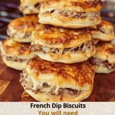 a stack of french dip biscuits sitting on top of a wooden cutting board with text overlay