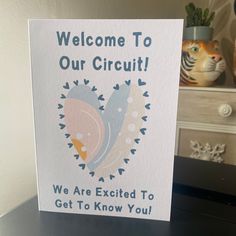 a card that says, welcome to our circuit we are excited to get to know you