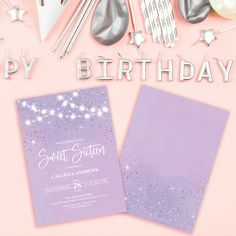 two purple and silver birthday cards with confetti on them next to other items